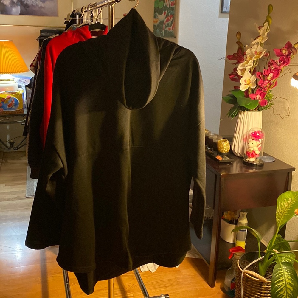 Black turtle neck shirt.